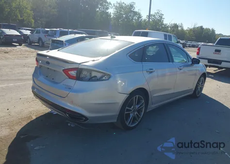 2016 Ford Fusion Titanium z USA, uszkodzony, nr VIN 3FA6P0D97GR138228
